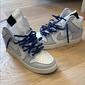 Brand new. Nike Air Force 1 high top sneakers. Never worn!
